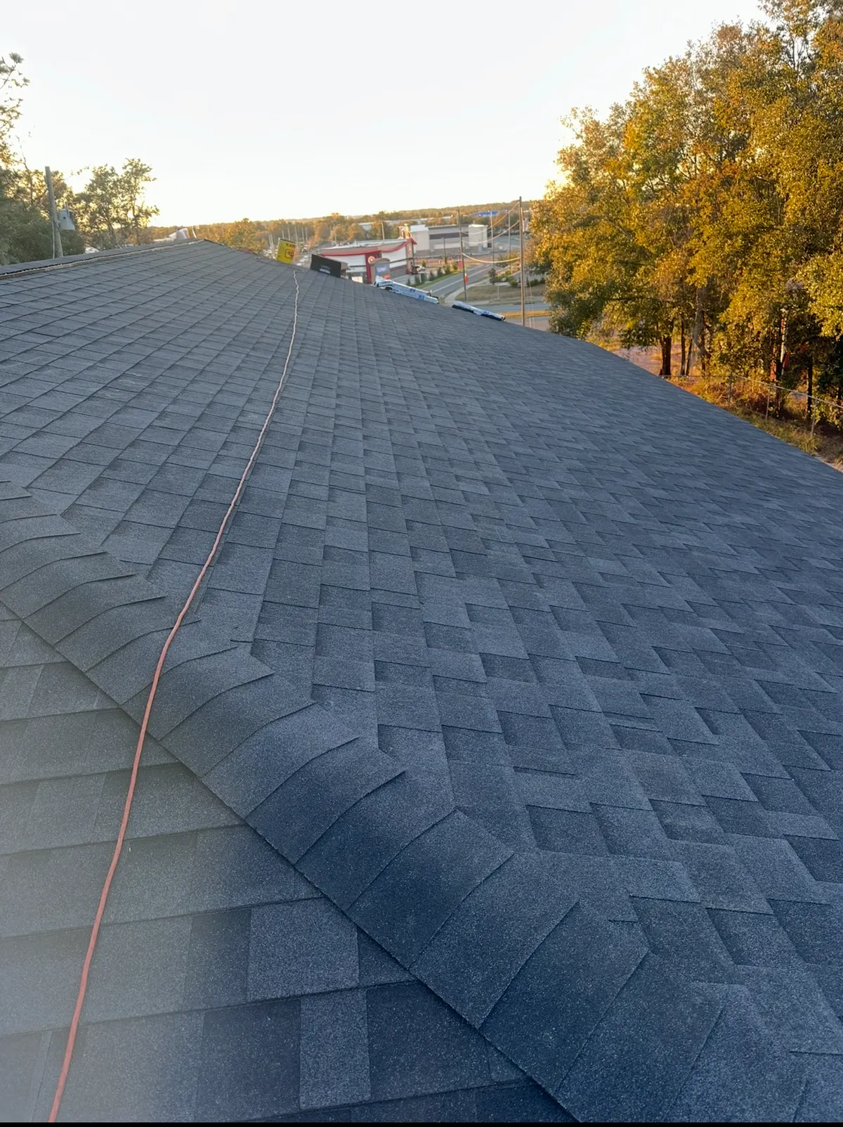 Completed black architectural shingle roof by Destination Roofing Inc. in Lecanto, Florida